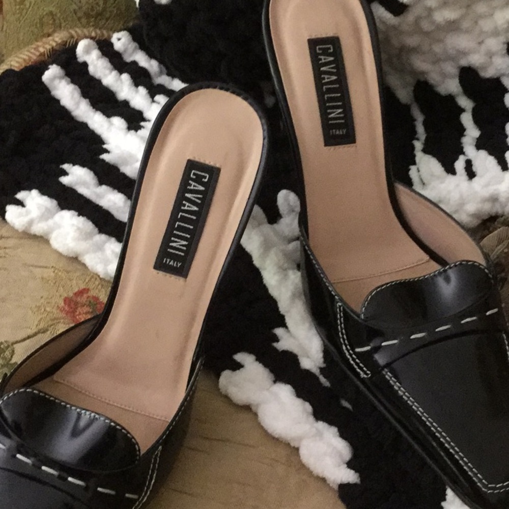 Mid high chunky heeled, slip on shoes.